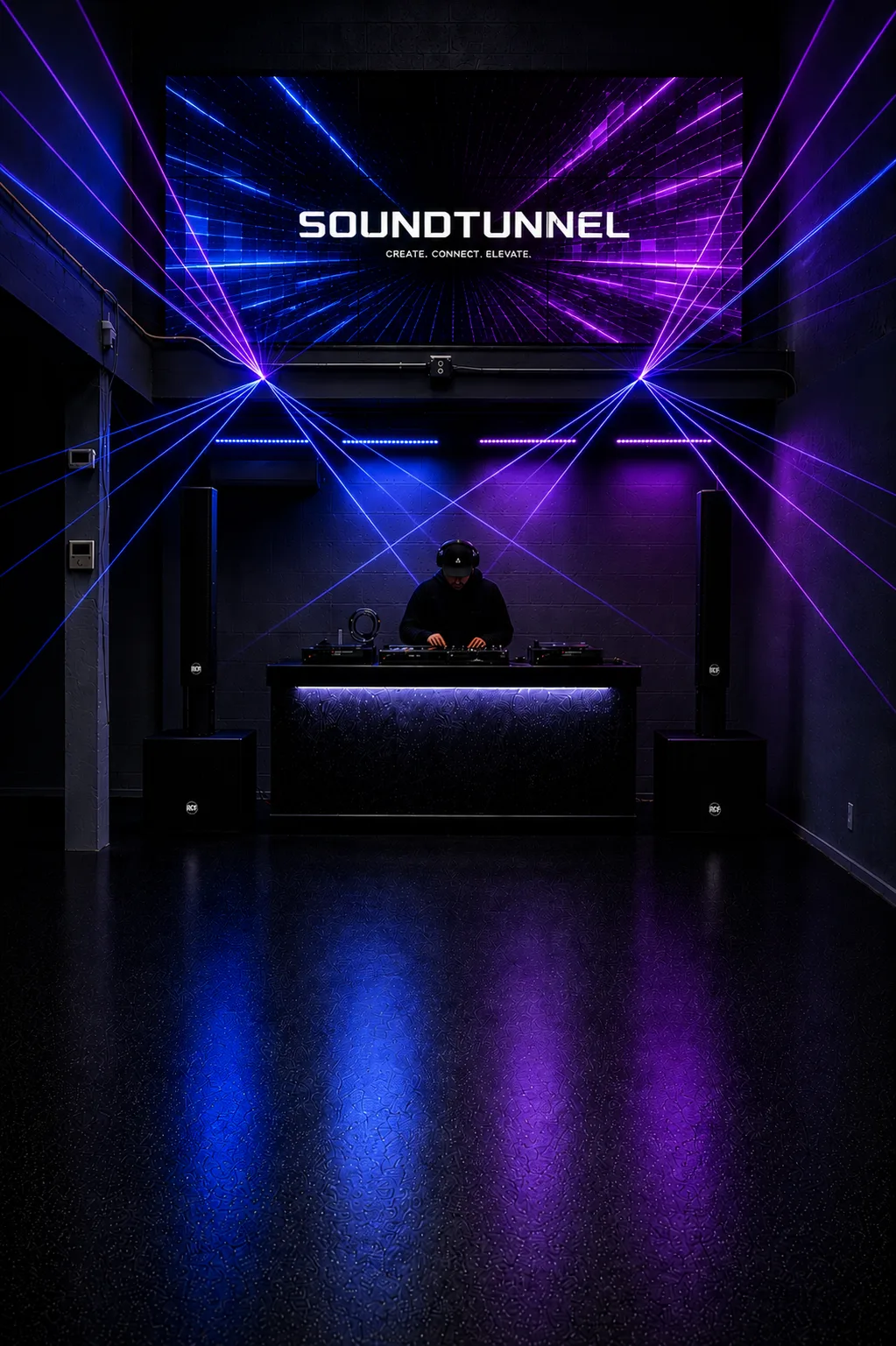 DJ performing at SoundTunnel with laser lighting and branded LED wall