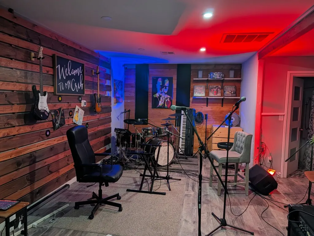 Studio A at Musicians World — drums, guitars, mics, and warm wood walls